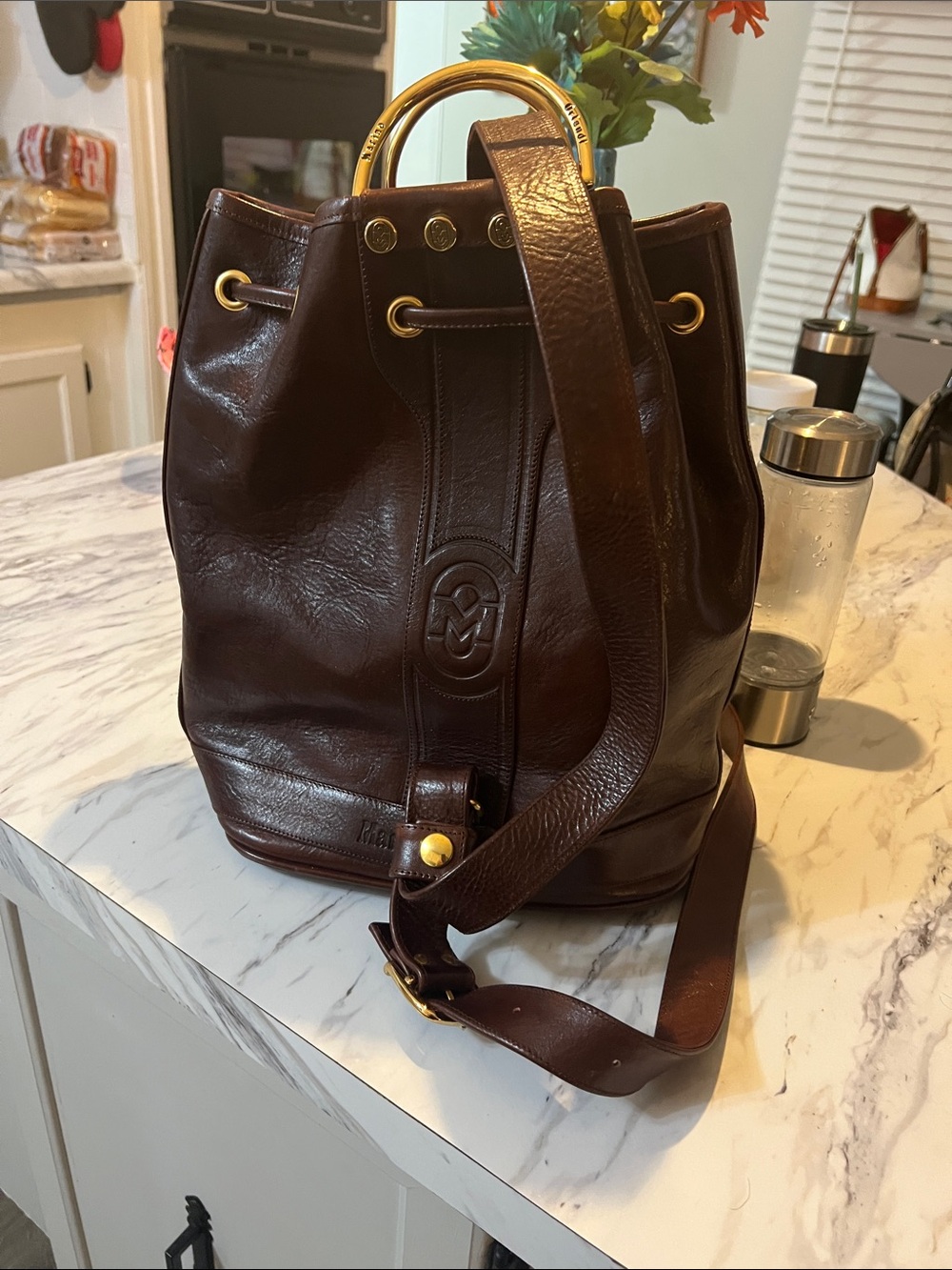 Marino Orlandi Dark Brown Leather Drawstring Bucket Backpack with Gold Accents